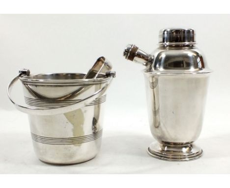 A silver plated cocktail shaker and ice bucket with tongs 