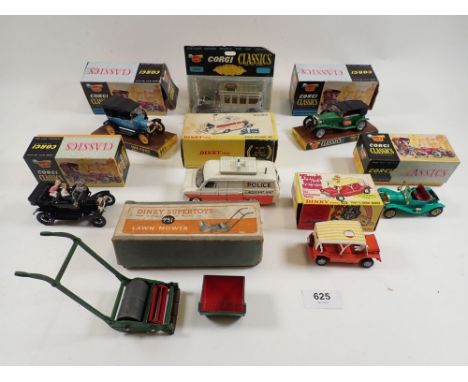 A collection of approximately twenty one various die cast vehicles in boxes, mainly Corgi Classics with some Dinky etc 