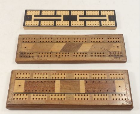Three various cribbage boards
