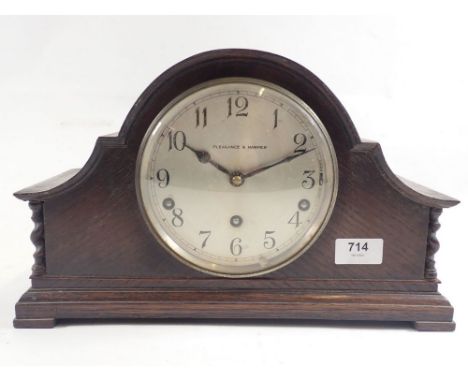 A 1930's Pleasance and Harper oak mantel clock, 22cm 