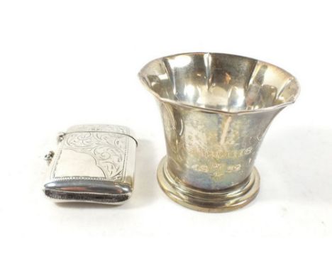 A silver vesta case, Birmingham 1919 and a Swedish silver 'Curling, 1927-32' cup, combined weight 76g 