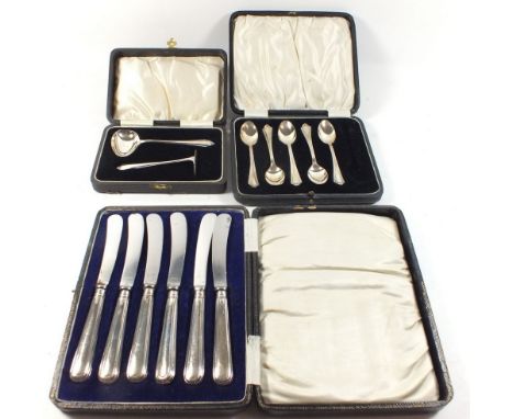 A silver babies pusher and spoon, a set of five silver teaspoons and a set of six silver handled knives 