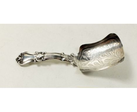 A Victorian silver caddy spoon with bright cut decoration, Birmingham 1843, makers mark George Unite 