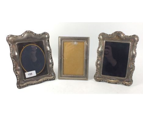 Two silver photograph frames, Sheffield 1989 and 1994, 20 x 15cm together with another photograph frame 