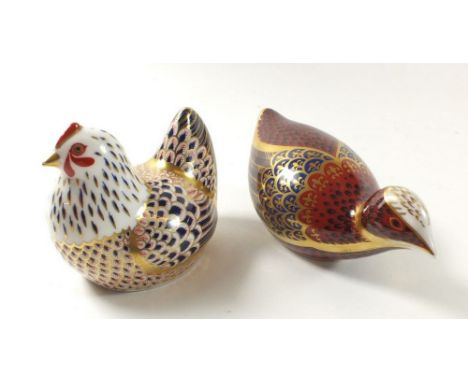 A group of two Royal Crown Derby Imari paperweights in the form of a chicken and coot (silver seals)