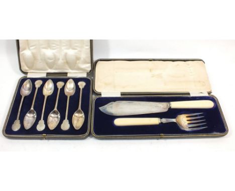 A set of silver fish servers, Sheffield 1904 and a set of silver plated teaspoons both boxed 