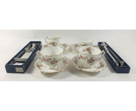 An Aynsley 'Grotto Rose' bachelor tea set and a Royal Worcester cake slice and knife, boxed 