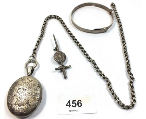 A silver locket and chain, a silver sword form brooch and a silver bangle, 47g 