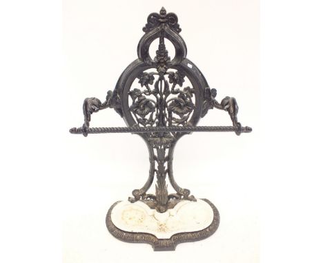 A Victorian cast iron stick stand with floral and foliage decoration