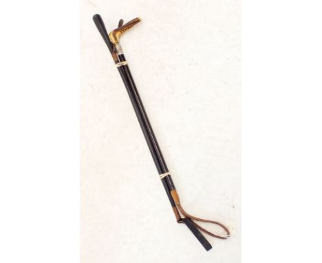 A silver and horn handled riding crop, a/f and a leather one