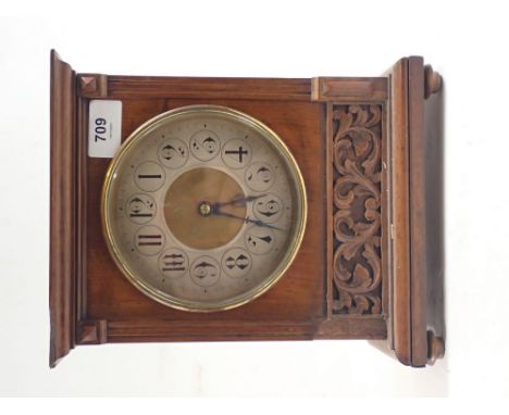 An early 20th century walnut mantel clock, 25.5cm high 