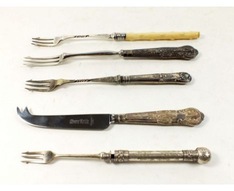Four pickle forks and one silver handled cheese knife 