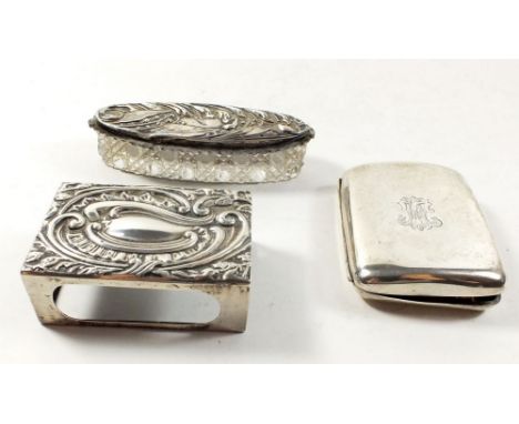 A silver matchbox cover, silver cigarette case and silver topped dressing table box, 104g