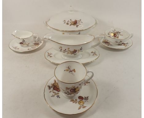 A Royal Worcester dinner service with brown and gilt floral and fruit decoration, comprising:- six cups and saucers, two mugs