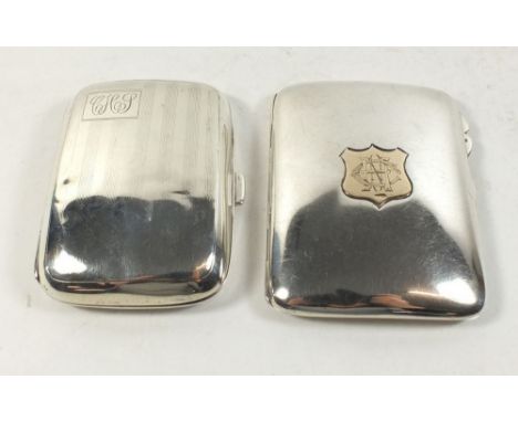 Two silver cigarette cases one Birmingham 1900, William Harrison Walter with 9 carat gold cartouche, the other Chester 1928 b