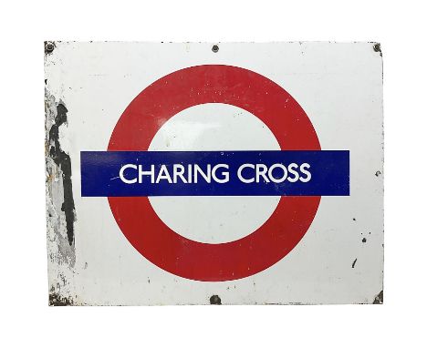 Enamel station sign for Charing Cross in red and blue on a white ground 56 x 71cm with hanging brackets