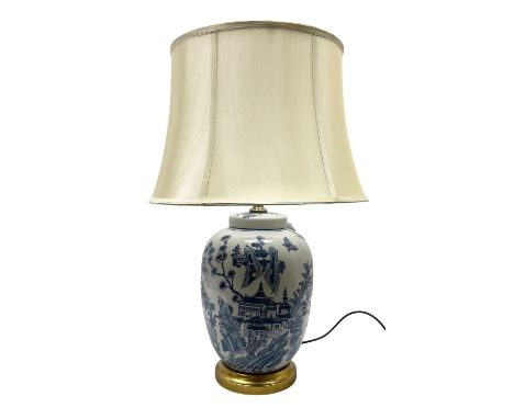 Table lamp of baluster form, decorated with a Japanese landscape on a white ground raised upon a gilt footed base, including 