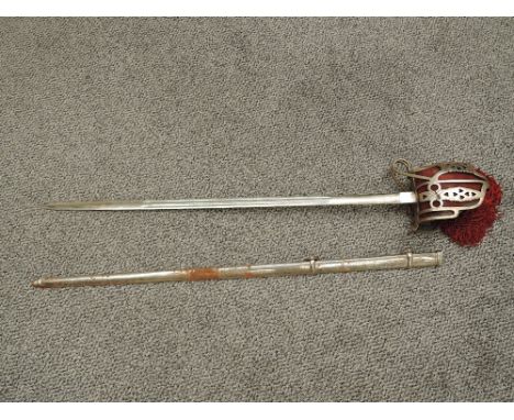 A Scottish basket hilt sword, 1828 pattern, dome pommel with a ball finial, basket hilt with heart piercing, blade marked wit