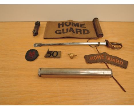 A collection of Militaria comprising, Home Guard cloth Arm Band and cloth Patch, No 50 cloth patch, Boy Scouts Cloth Badge an