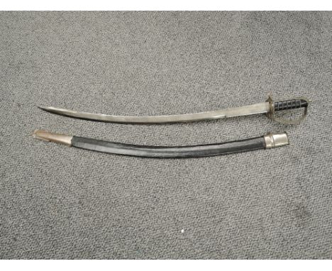 An Indian Calvary Sword, curved blade marked Made In India, wire and wood grip with metal guard and leather and metal scabbar