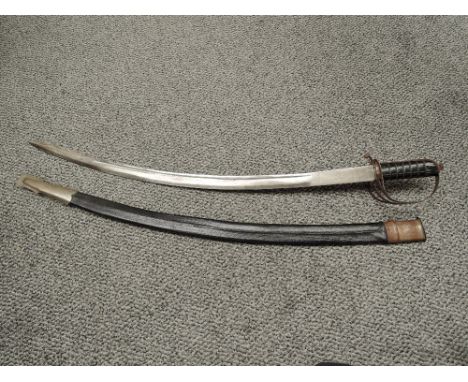 An Indian Calvary Sword having decorated curved blade MADE IN INDIA, wood and wire grip with pierced guard, blade length 76cm