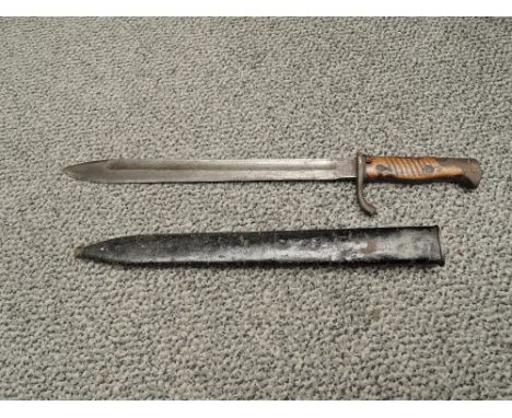 A German Mauser Bayonet pattern 1915, blade marked Waffenfabrik Mauser A.G. Oberndore, blade length 35.5cm, overall length 49