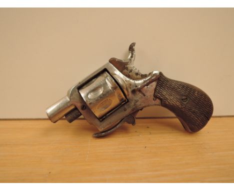 A vintage 8 shot starting pistol with foldaway trigger, patent numbers to one side, Pat 62??? &amp; 2624 14
