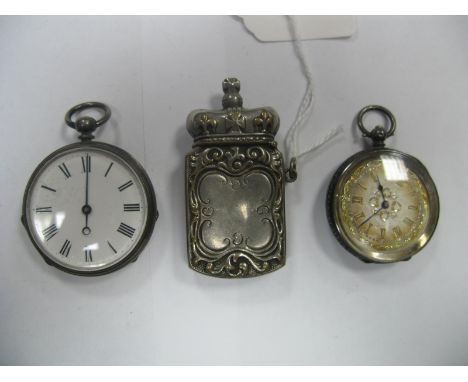 A Ladies Fob Watch, the decorative dial with Roman numerals, within allover foliate engraved case, stamped "0.935"; together 