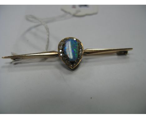 An Opal and Diamond Set Bar Brooch, the oval opal in matrix claw set within pear shape border of old and single cut diamonds,