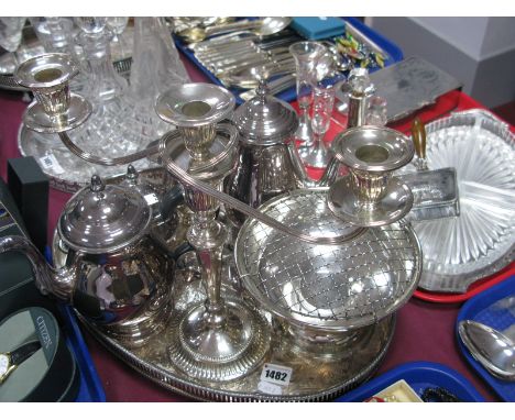 A Plated Two Branch Candelabra, Viners four piece tea-coffee service, plated Posie bowl, on a plated oval tray.
