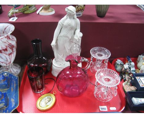 A XIX Century Cranberry Glass Decanter, ruby glass carafe and glass, pair of glass candlesticks with drops, XIX Century Paria