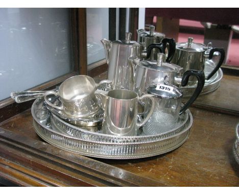 E.P.N.S Four Piece Tea Service, plated bowl, tea stainer, two plated trays.