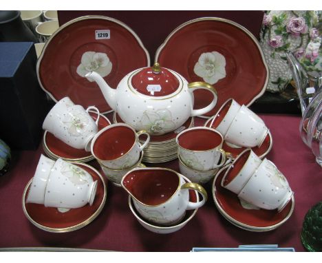A Susie Cooper Tea Service, "Azalea" pattern, with terracotta decoration, forty two pieces:- One Tray