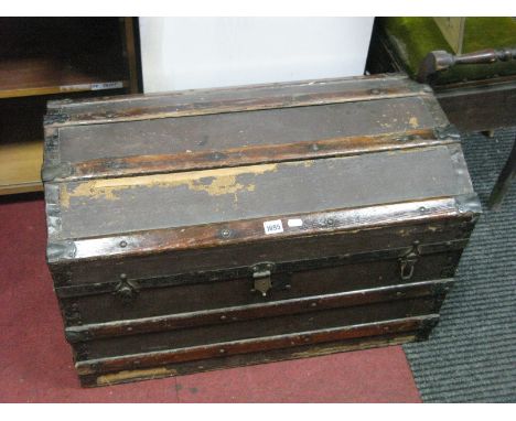An Iron Banded Dome Topped Travelling Trunk, with wooden slats.