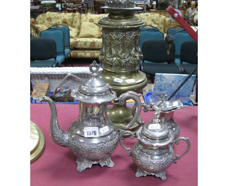 A Three Piece White Metal Presentation Tea Service, early XX Century brass oil lamp.