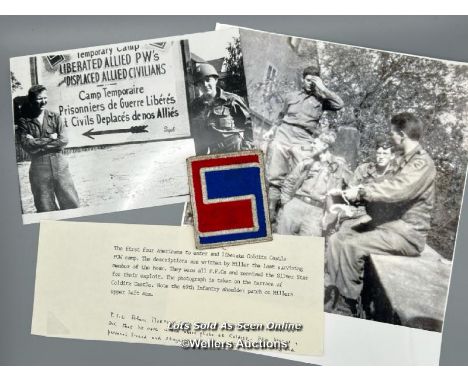 A WW2 69th Infantry Division shoulder patch presented to Michael Booker by P.F.C. Alan H. Murphey, one of the four Americans 