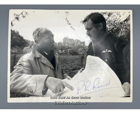 A signed black and white photograph by Major Patrick "Pat" Reid depicted in the photograph alongside David McCallum during th
