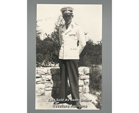 A signed black and white photograph of Major Theodor Rumpel, shown under 'House Arrest' awaiting Court Martial as Commandant 