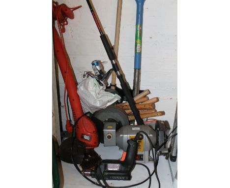 A BENCH GRINDER WITH ASSORTED TOOLS, FISHING ROD, ETC