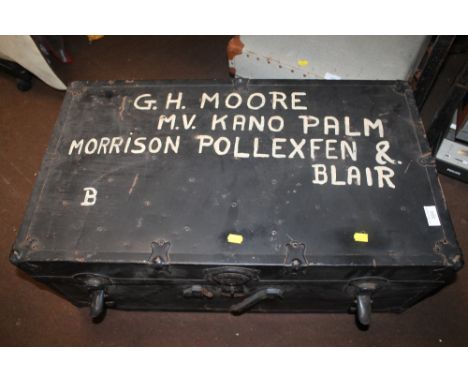 A LARGE TIN TRUNK 