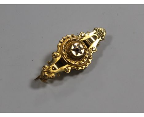 A RUBY DIAMOND BROOCH