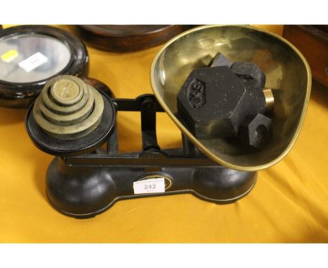 A SET OF SALTER SCALES AND VARIOUS WEIGHTS 