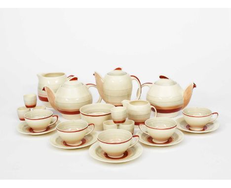 A large Susie Cooper Productions Kestrel service designed by Susie Cooper, pattern no.479, painted with graduated rust bands,