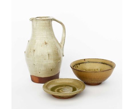 Phil Rogers (1951-2020)Jugstoneware, with applied decoration, covered to the foot with a cream glaze with iron spots, a stone