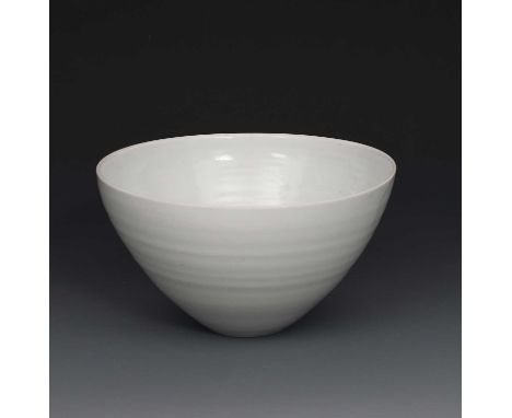 Φ Joanna Constantinidis (1927-2000)Bowlporcelain, flaring form covered in a pale celadon glazeimpressed seal mark, 15.3cm. di