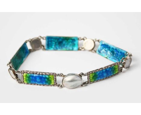 An Arts and Crafts silver and enamel bracelet, wide rectangular links enamelled green and blue, the backs enamelled blue, wit