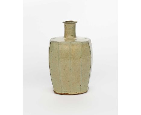 Φ Phil Rogers (1951-2020)Bottlestoneware, faceted form, covered in a pale ash glaze,impressed seal mark,26cm. high  Provenanc