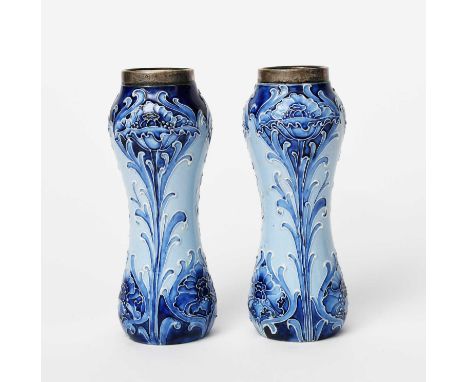 'Poppy' a pair of James Macintyre &amp; Co Florian Ware vases designed by William Moorcroft, waisted cylindrical form painted