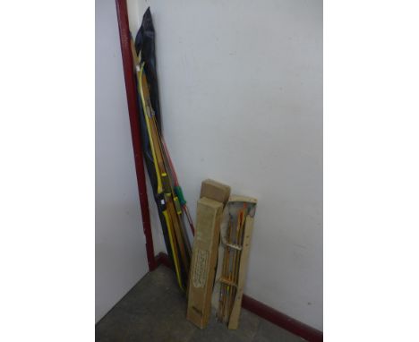 Six vintage bows and assorted arrows 