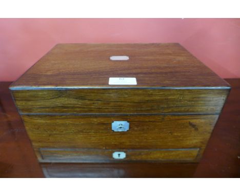 A Victorian rosewood and mother of pearl inlaid lady's travelling vanity box 